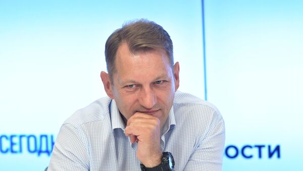 Заместитель главного редактора МИА Россия сегодня Андрей Благодыренко во время пресс-конференции  - Sputnik Литва