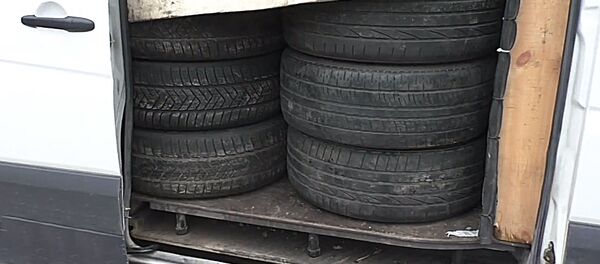 Обыски по делу о мошенничестве в компании по перевозке автомобильных запчастей Обыски по делу о мошенничестве в компании по перевозке автомобильных запчастей - Sputnik Литва