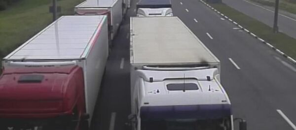 Очереди в пункте пропуска Каменный Лог, 25 июля 2020 Очереди в пункте пропуска Каменный Лог, 25 июля 2020 - Sputnik Литва