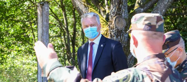Президент Литвы Гитанас Науседа во время посещения подразделений Службы охраны государственной границы Президент Литвы Гитанас Науседа во время посещения подразделений Службы охраны государственной границы - Sputnik Lietuva