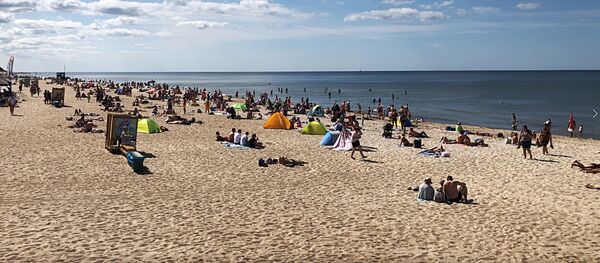 Sputnik Литва узнал, как отдыхают приехавшие в Палангу на фоне COVID-19 - Sputnik Литва