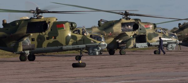 Вертолеты Ми-24 авиационной группы Военно-воздушных сил Белоруссии, архивное фото - Sputnik Литва
