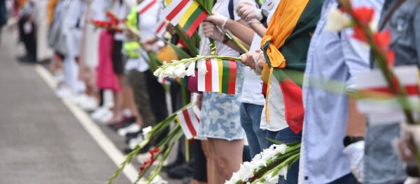 Акция в Вильнюсе в поддержку протестующих в Белоруссии - Sputnik Литва