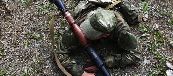 Военнослужащий вооруженных сил Белоруссии во время прохождения конкурса, архивное фото Военнослужащий вооруженных сил Белоруссии во время прохождения конкурса, архивное фото - Sputnik Литва