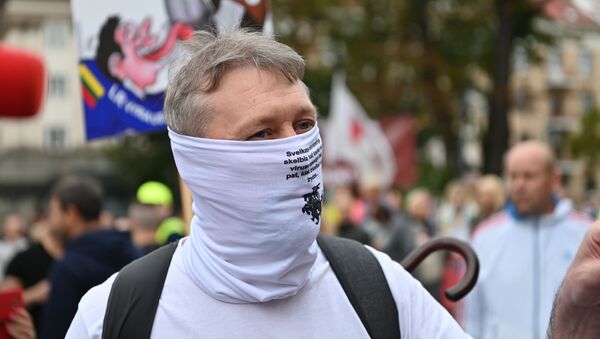 Митинг против ношения масок в Вильнюсе - Sputnik Литва