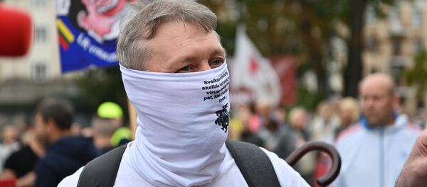 Митинг против ношения масок в Вильнюсе - Sputnik Литва