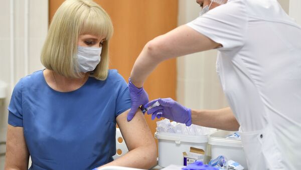 Вакцинация добровольцев против COVID-19 в Москве - Sputnik Lietuva