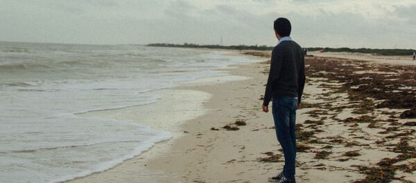 Человек на пляже - Sputnik Литва