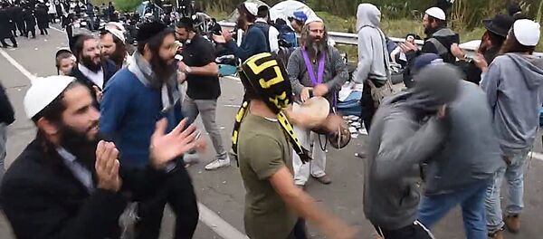 Пикник и танцы хасидов: обстановка на белорусско-украинской границе - Sputnik Литва