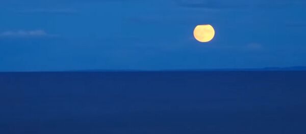 Rudens lygiadienio Mėnulis: nufilmuota pirmoji spalio pilnatis Rudens lygiadienio Mėnulis: nufilmuota pirmoji spalio pilnatis - Sputnik Lietuva