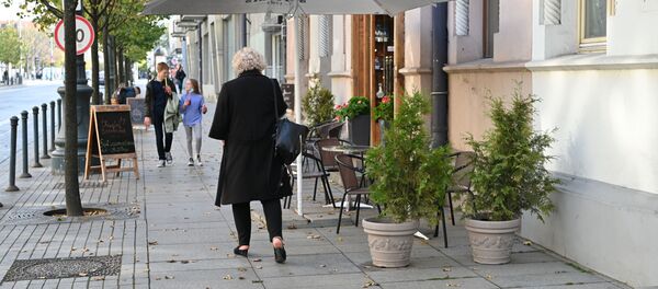 Осенняя улица в Вильнюсе Осенняя улица в Вильнюсе - Sputnik Литва