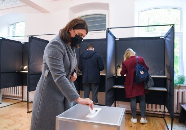 Это праздник демократии: президент Литвы проголосовал на выборах в Сейм - Sputnik Литва