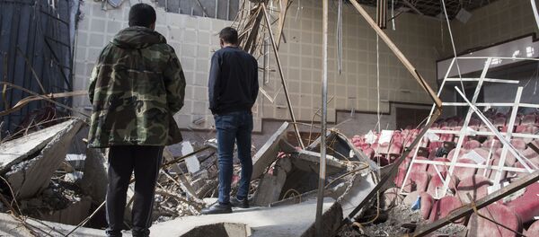 Разрушенный обстрелом кинотеатр в городе Шуши в Карабахе Разрушенный обстрелом кинотеатр в городе Шуши в Карабахе - Sputnik Lietuva