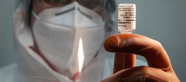 Российская вакцина против коронавируса Спутник V - Sputnik Литва