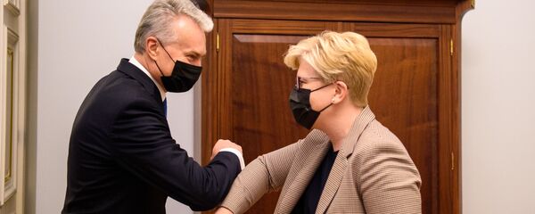 Президент Литвы Гитанас Науседа и назначенный премьер Ингрида Шимоните - Sputnik Литва