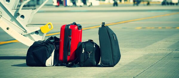 Чемоданы в аэропорту Чемоданы в аэропорту - Sputnik Литва