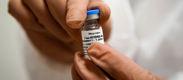 Российская вакцина против коронавируса Спутник V Российская вакцина против коронавируса Спутник V - Sputnik Lietuva