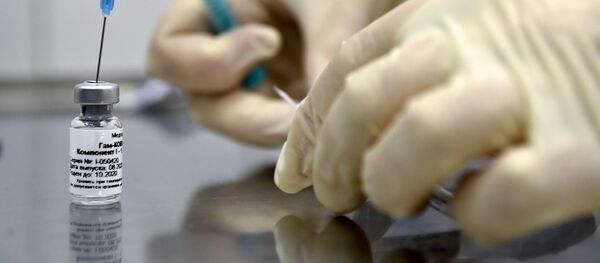 Российская вакцина от коронавируса Российская вакцина от коронавируса - Sputnik Lietuva