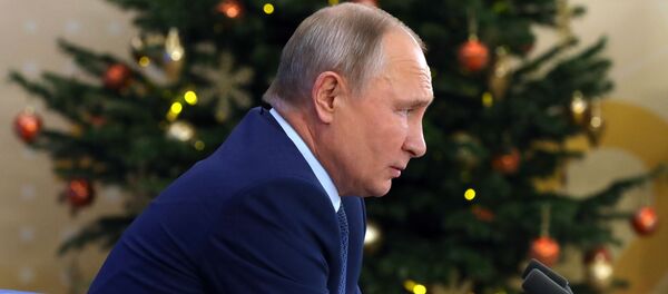 Президент РФ Владимир Путин на большой ежегодной пресс-конференции Президент РФ Владимир Путин на большой ежегодной пресс-конференции - Sputnik Lietuva