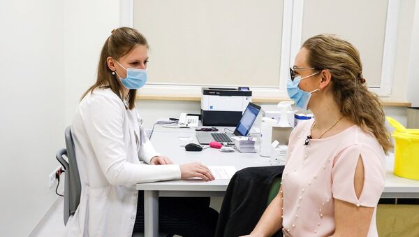 Вакцинация в Каунасской клинике в Литве  - Sputnik Литва