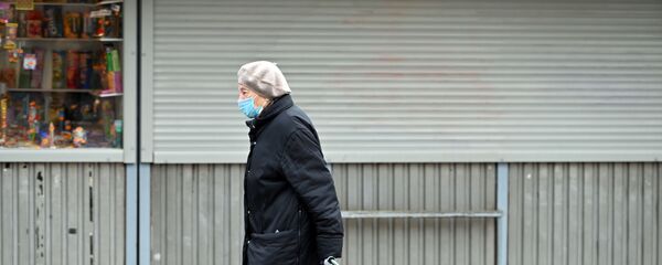 Прохожие на улице в Вильнюсе Прохожие на улице в Вильнюсе - Sputnik Литва