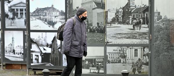 Прохожий на улице в Вильнюсе Прохожий на улице в Вильнюсе - Sputnik Lietuva