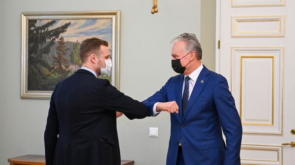 Глава МИД Литвы Габриэлюс Ландсбергис и президент Литвы Гитанас Науседа - Sputnik Литва