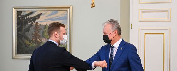 Глава МИД Литвы Габриэлюс Ландсбергис и президент Литвы Гитанас Науседа Глава МИД Литвы Габриэлюс Ландсбергис и президент Литвы Гитанас Науседа - Sputnik Литва