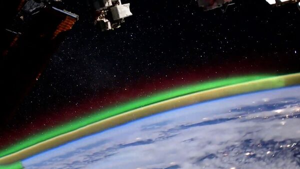 Внеземная красота: российский космонавт снял северное сияние - Sputnik Литва
