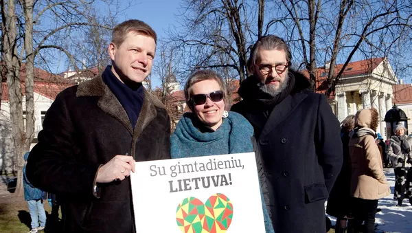Мэр Вильнюса Ремигиюс Шимашюс с супругой Агне Матулайте (слева на снимке)