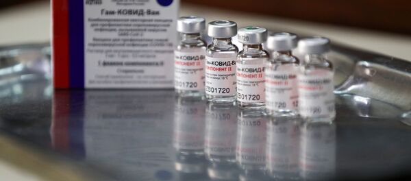 Флаконы с вакциной Спутник V Флаконы с вакциной Спутник V - Sputnik Lietuva