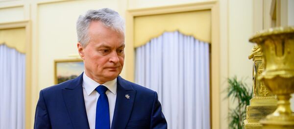 Президент Литвы Гитанас Науседа почтил память жертв Холокоста - Sputnik Литва