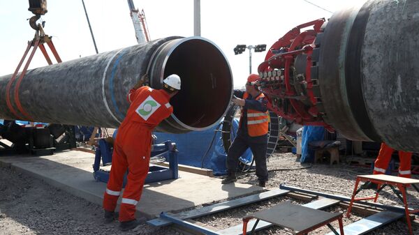 Рабочие на строительной площадке газопровода Северный поток-2 - Sputnik Литва