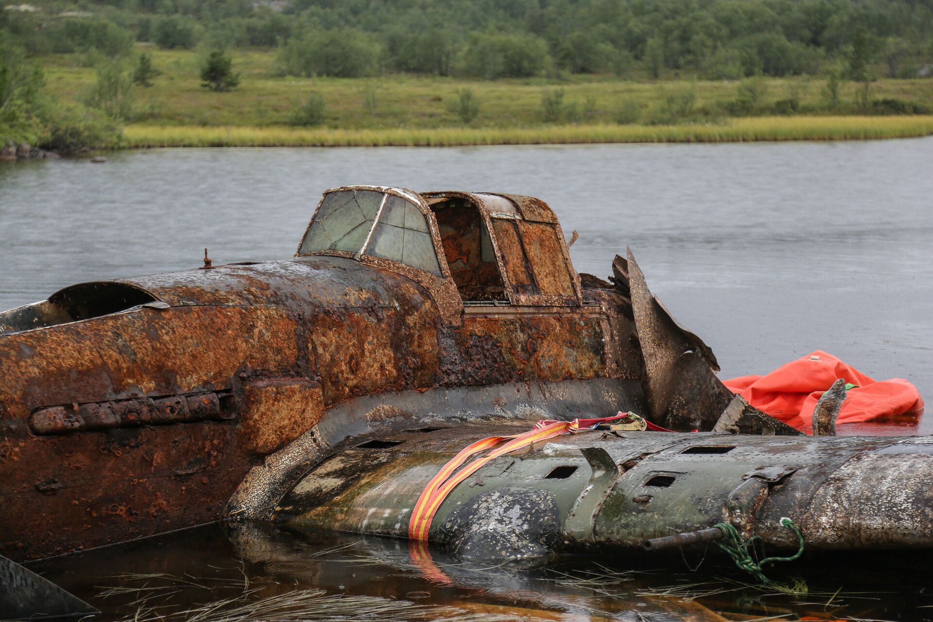 Штурмовик Ил-2 времен Великой Отечественной войны, поднятый из озера Кулонга в Мурманской области, 9 августа 2018 - Sputnik Lietuva, 1920, 12.05.2021