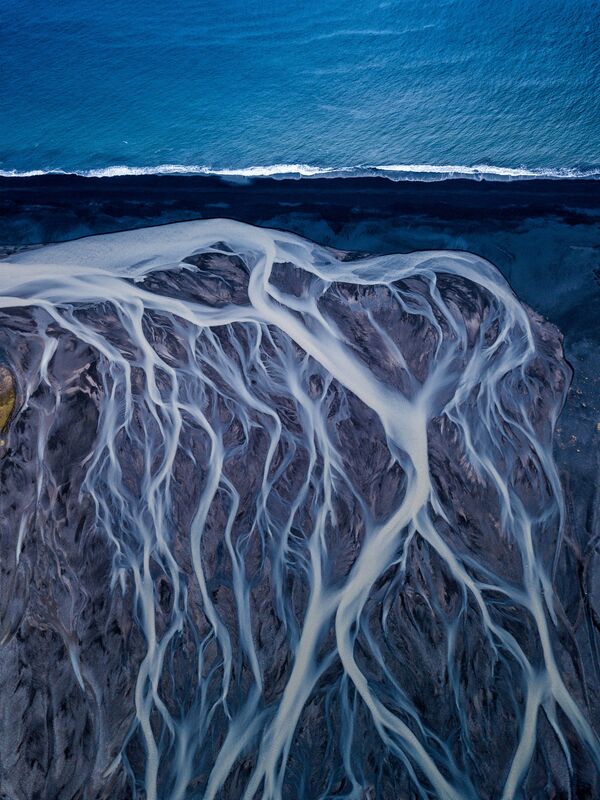 Indijos fotografo Dipanjan'o Pal'o nuotrauka Glacial Veins. Ledinė upė, įtekanti į Atlanto vandenyną. - Sputnik Lietuva
