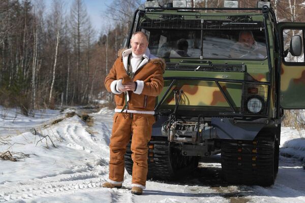 Rusijos prezidentas Vladimiras Putinas per pasivaikščiojimą taigoje. - Sputnik Lietuva