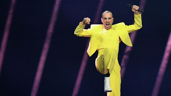Участник The Roop of Lithuania выступает во время первого полуфинала конкурса песни Евровидение 2021 - Sputnik Литва