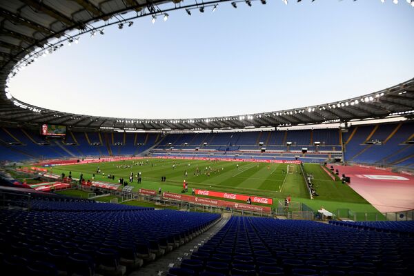 Romoje, &quot;Olimpico&quot; stadione, vyks UEFA EURO 2020 atidarymo rungtynės. Stadionas talpina daugiau nei 72 tūkstančius žiūrovų, tačiau tai nėra taip aktualu esant COVID-19 pandemijai. Pirmosios į aikštę žengia Turkijos ir Italijos rinktinės. - Sputnik Lietuva