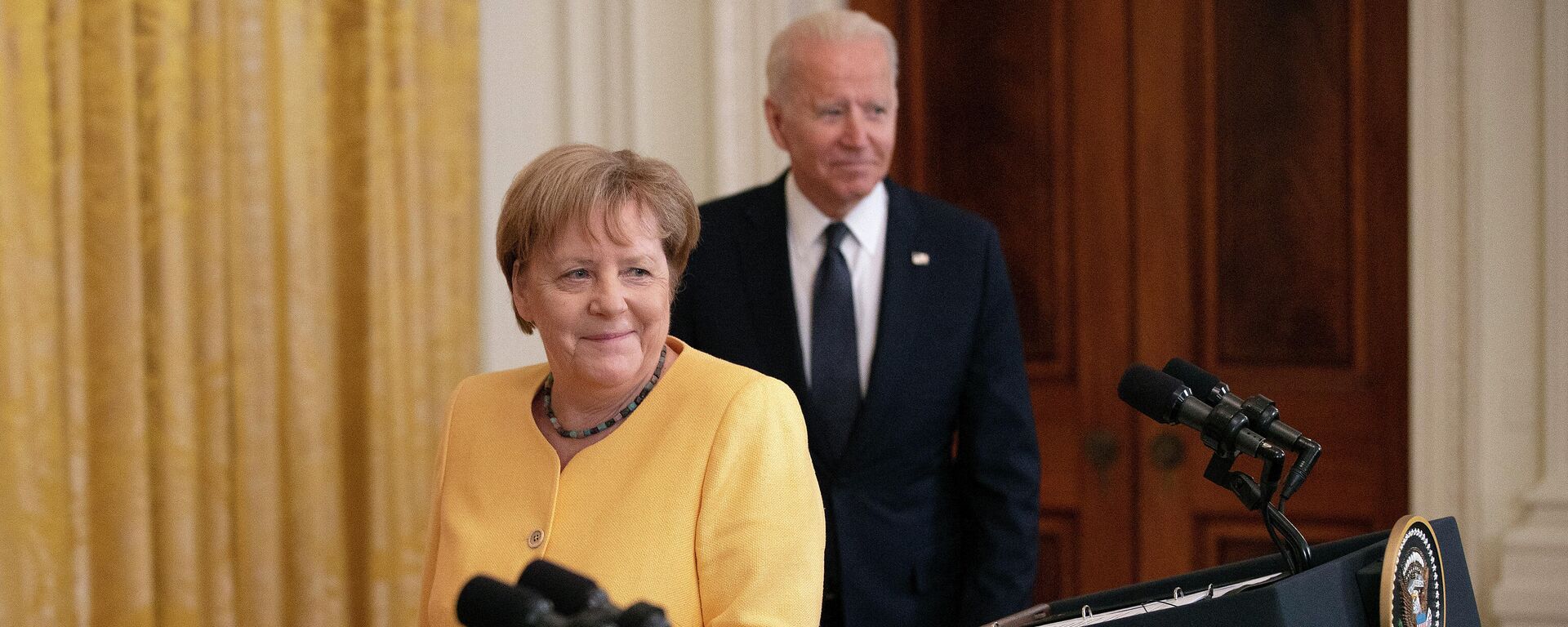 JAV prezidentas Džo Baidenas ir Vokietijos kanclerė Angela Merkel - Sputnik Lietuva, 1920, 22.07.2021