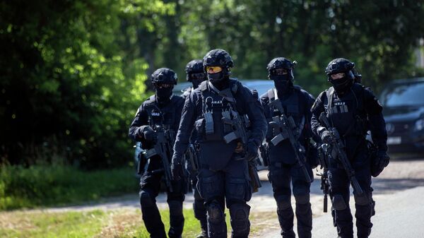 Члены подразделения литовской полиции по антитеррористическим операциям ARAS - Sputnik Литва
