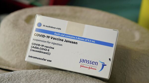 Упаковка с вакциной против коронавируса от Johnson & Johnson - Sputnik Литва