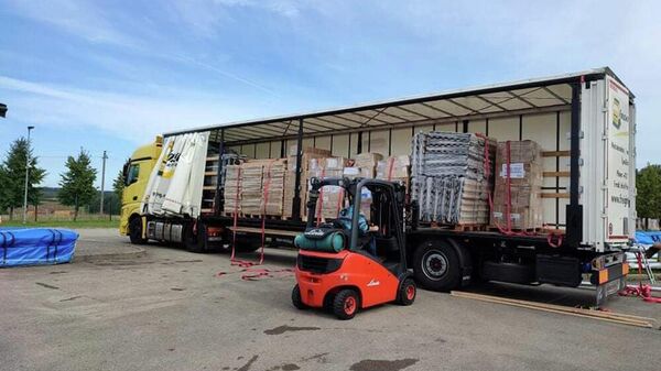 Гуманитарная помощь от Словакии и Норвегии, Люксембурга для пограничной службы Литвы - Sputnik Литва
