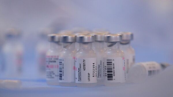 Ампулы с вакциной Pfizer/BioNTech от коронавируса - Sputnik Литва