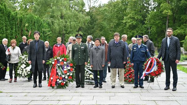 В Вильнюсе прошла акция памяти в годовщину окончания Второй мировой войны - Sputnik Литва