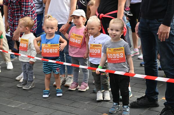 Vaikai galėjo išbandyti savo jėgas dalyvaudami 200 metrų bėgime. - Sputnik Lietuva