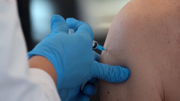 Вакцинация российским препаратом Гам-Ковид-Вак (Спутник V) от коронавирусной инфекции COVID-19, архивное фото - Sputnik Lietuva