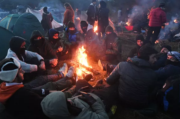 Neteisėti migrantai Lenkijos ir Baltarusijos pasienyje. Neteisėti migrantai Lenkijos ir Baltarusijos pasienyje. - Sputnik Lietuva