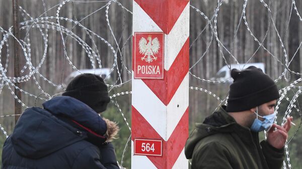 Nelegalių migrantų stovykla Baltarusijos ir Lenkijos pasienyje - Sputnik Lietuva