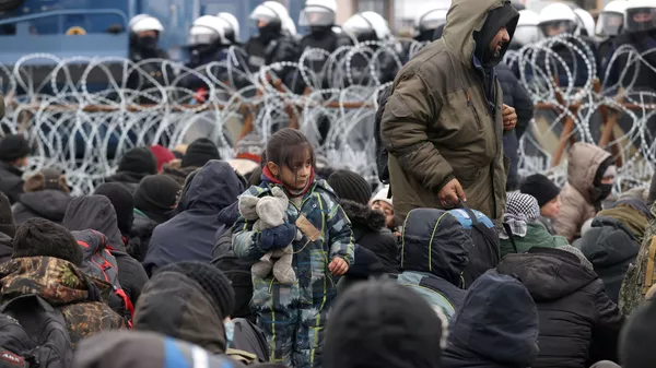 Migrantai Baltarusijos—Lenkijos pasienyje - Sputnik Lietuva