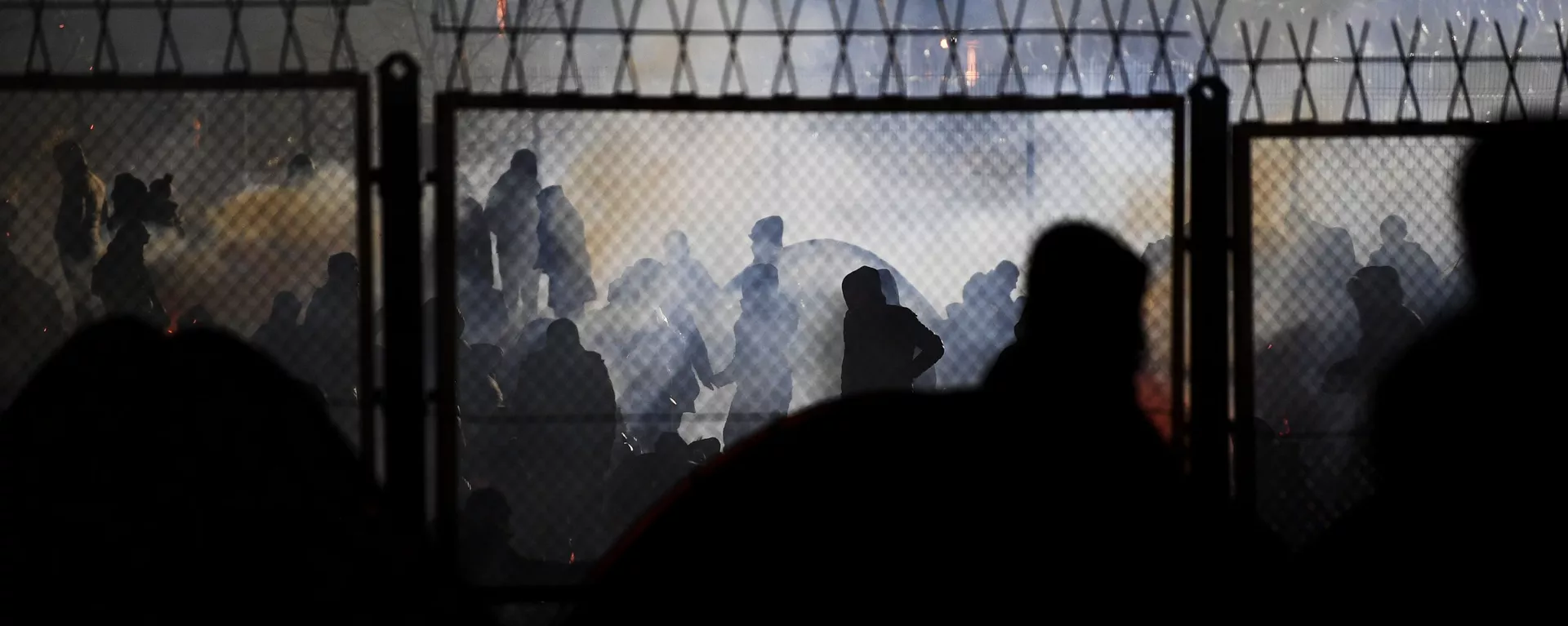 Neteisėti migrantai Baltarusijos ir Lenkijos pasienyje - Sputnik Lietuva, 1920, 16.11.2021